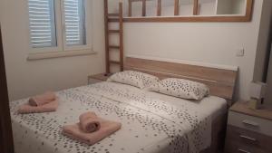 Posteľ alebo postele v izbe v ubytovaní Apartments Juliet
