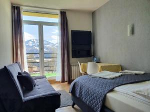 Posteľ alebo postele v izbe v ubytovaní Willa Orle Gniazdo + 37 fotografií
