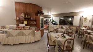 Restaurace v ubytování Albergo Al Cacciatore