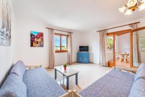 TV a/nebo společenská místnost v ubytování Apartamentos Karin 2ºD