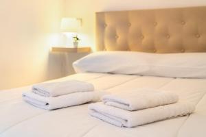 Postel nebo postele na pokoji v ubytování Apartamentos Karin 2ºD