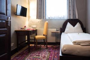Voodi või voodid majutusasutuse Altstadt Hotel Stadtkrug toas