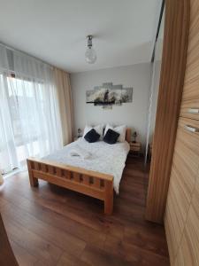 Luksusowy Apartament ul. Kwiatkowskiego 객실 침대