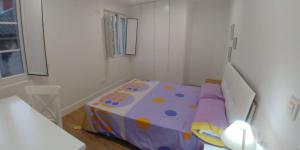 Łóżko lub łóżka w pokoju w obiekcie Cómodo apartamento en zona antigua dos
