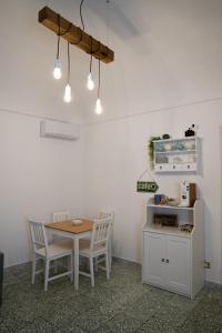 Virtuvė arba virtuvėlė apgyvendinimo įstaigoje Vento del sud