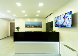 TV a/nebo společenská místnost v ubytování Downtown Suites Yerevan
