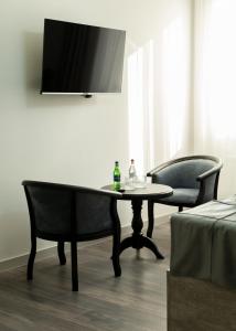 TV a/nebo společenská místnost v ubytování Downtown Suites Yerevan