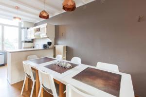 Kuchyň nebo kuchyňský kout v ubytování Cocoon - Duplex 3 chambres 140 m2