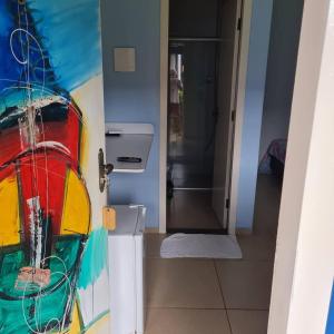 a view of a bathroom with a shower and a door at Pousada Cachoeiras do Jalapão in São Félix do Tocantins