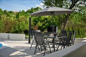 Patio nebo venkovní prostory v ubytování Villa Burra