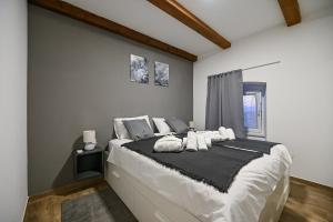 Postel nebo postele na pokoji v ubytování Villa Burra
