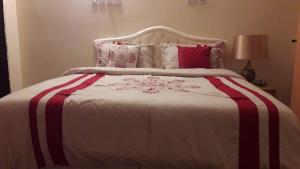 Кровать или кровати в номере Ahlam Musandam Villa