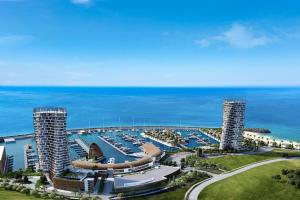 an aerial view of a marina with tall towers at Ayia Napa Boutique Apartments in Ayia Napa