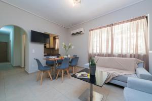 Televízia a/alebo spoločenská miestnosť v ubytovaní Phoenix Apartments - B2 & B3