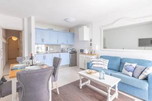 Kuchyňa alebo kuchynka v ubytovaní Apartamento Corazón Playa + 17 fotografií
