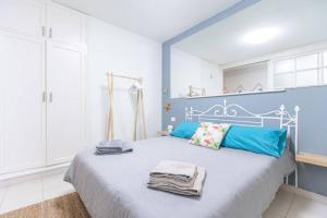 Posteľ alebo postele v izbe v ubytovaní Apartamento Corazón Playa