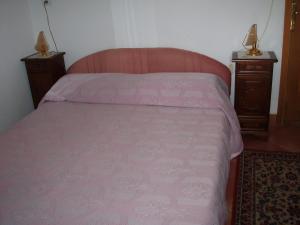 Postel nebo postele na pokoji v ubytování Apartments Butinar Pri Kapitanu