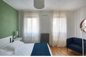 Postel nebo postele na pokoji v ubytování Ca' Cornello