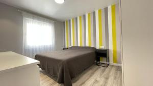 Łóżko lub łóżka w pokoju w obiekcie Torrevieja apartment