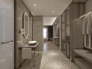 een badkamer met een wastafel en een spiegel bij Mercure Anyang Downtown in Anyang +38 foto's