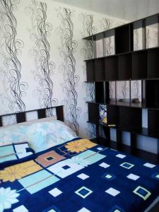 Łóżko lub łóżka w pokoju w obiekcie Apartment on Parkovaya