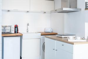 Kuchyňa alebo kuchynka v ubytovaní Hauzify I Loft Brisa del Mar