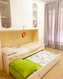 A bed or beds in a room at La Casa Di Rosa
