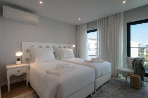 Кровать или кровати в номере Simple&Charming Guest Apartment