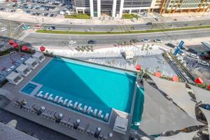 an overhead view of a swimming pool on a building at New Arabian MAG 318 Business Bay in Dubai