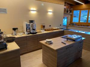 Příslušenství pro přípravu čaje a kávy v ubytování Hotel Trieste