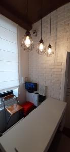 Postel nebo postele na pokoji v ubytování Kraków Chilli Hostel