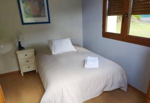Postel nebo postele na pokoji v ubytování Casa Barizo- Malpica