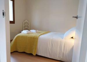 Postel nebo postele na pokoji v ubytování Casa Barizo- Malpica