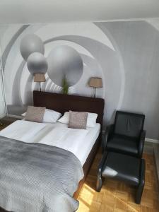Uma cama ou camas num quarto em Hotel-Nordsee Dagebüll