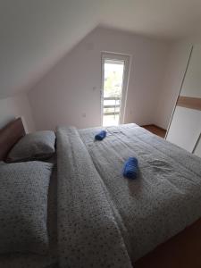 Voodi või voodid majutusasutuse Apartman Djokovic toas