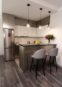 Kuchyň nebo kuchyňský kout v ubytování Downtown Suites Yerevan