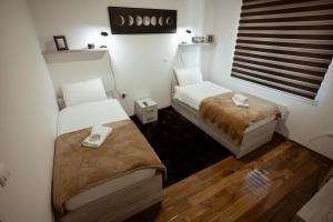 Uma cama ou camas num quarto em Zlatar Apartman br 16