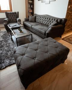Uma área de estar em Zlatar Apartman br 16