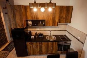 A cozinha ou kitchenette de Zlatar Apartman br 16