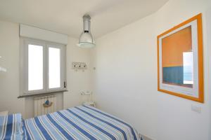 Posteľ alebo postele v izbe v ubytovaní alta marea