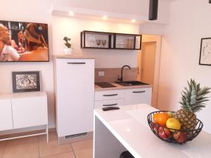 Kuchyň nebo kuchyňský kout v ubytování Apartment IVA Studio