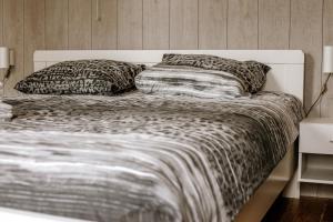 Un pat sau paturi într-o cameră la Hotel 't Welink
