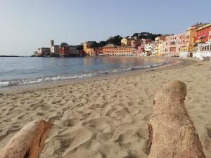a sand sculpture on a beach near the water at Hotel Sereno in Sestri Levante