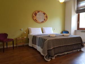 Ліжко або ліжка в номері Appartamento Binario 1