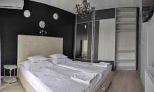 Krevet ili kreveti u jedinici u objektu IKON apartman