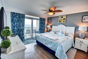 Katil atau katil-katil dalam bilik di Grand Atlantic Resort 601 Condo
