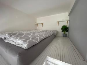 Postel nebo postele na pokoji v ubytování Downtown Flat under Spilberk Castle