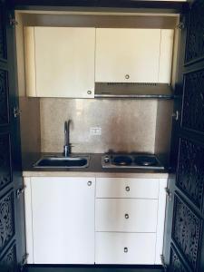 A kitchen or kitchenette at Sharm Domina Royal Suites
