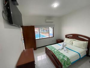 Кровать или кровати в номере Hotel Maratea Melgar