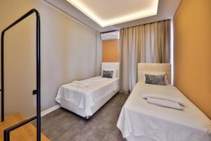 A bed or beds in a room at Duygu Apart